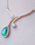 Natural Colombian emerald necklace sourced from the Muzo mines in Colombia a natural pear cut 2.96 carats