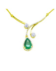 Colombian emerald gold necklace deep green hue teardrop pendant halo diamond.