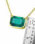 18k Yellow gold Emerald solitaire necklace 5.52 carats emerald-cut natural sourced from the Muzo mine, set in a handcrafted frame