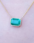 Gift for Mother's Day solitaire emerald necklace natural sourced from the Muzo mine, set in a handcrafted 18k yellow gold frame