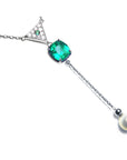 Cushion cut natural emerald necklace with freshwater pearl danglin, crafted in 14k white gold