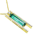 14k yellow gold necklace with a natural colombian emerald gemstone and small lateral diamonds.