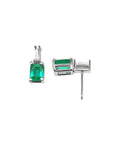 Colombian emerald and baguette diamond stud earrings in 14K white gold.