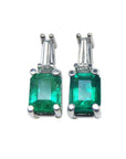 Emerald and baguette diamond earrings, 14 white gold, front side position top view.