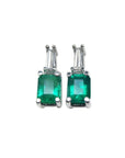 Emerald and baguette diamond studded earrings, made of 14 white gold.