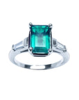 Natural Muzo colombian emerald and baguette side diamond ring for women crafted in 18 white gold.