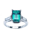 Natural Muzo colombian emerald and baguette side diamond ring for women crafted in 18 white gold.