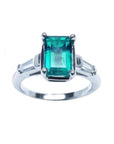 Natural Muzo colombian emerald and baguette side diamond ring for women crafted in 18 white gold.