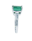 In the side profile view of this emerald and baguette side diamond ring is visible its high quality.