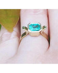 A yellow gold colombian emerald ring bezel set crafted in solid 14k yellow gold.