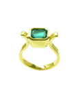 0.93 ct. solitaire Colombian emerald ring in 14K yellow gold, featuring a bezel-set emerald cut stone.