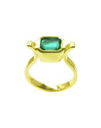 0.93 ct. solitaire Colombian emerald ring in 14K yellow gold, featuring a bezel-set emerald cut stone.