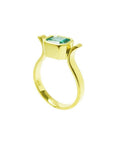 14K yellow gold solitaire ring with a bezel-set emerald-cut Colombian emerald.