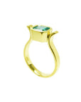 14K yellow gold solitaire ring with a bezel-set emerald-cut Colombian emerald.