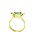 0.93 ct. solitaire Colombian emerald ring in 14K yellow gold, featuring a bezel-set emerald cut stone.