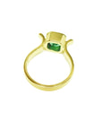 0.93 ct. solitaire Colombian emerald ring in 14K yellow gold, bezel set.