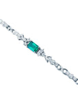 1.08 carat Muzo Colombian emerald bracelet with rectangular deep bluish-green emerald and diamond accents in 14K white gold.
