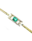 A 14k gold bracelet with a genuine square colombian emerald with diamonds accent.