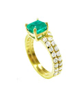 1.39 carat emerald bridal ring set with matching diamond band in 14K gold.