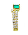 This emerald bridal ring with matching band set displays the top main gemstone and side bands profile.