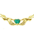 Hearth cut emerald claddagh necklace natural Colombian deep green color Muzo mines crafted in 14k yellow gold