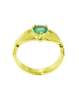 14K yellow gold Claddagh ring with a pear-shaped, medium-green emerald.