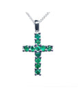 18K white gold cross pendant necklace with 0.55 ct. round-cut emeralds, prong set on a delicate chain.