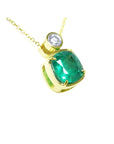 Right side profile of a cushion cut emerald pendant necklace, top and gallery view.