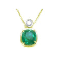 Vibrant 3.43 ct. cushion-cut emerald pendant in 18K yellow gold with a diamond accent.