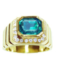 Front position top view of an emerald-cut men's emerald ring bezel set crafted in 18k yellow gold.
