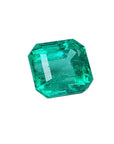 Emerald-cut Muzo Colombian loose emerald, front right-side table and crown visibles