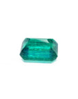 Vibrant bluish-green 4.18 carat emerald-cut loose emerald from Muzo, Colombia.