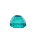 1.55 carat emerald-cut Muzo Colombian loose emerald, sparkling medium bluish green.