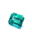 Gia certified emerald-cut loose Colombian emerald right side view displaying crown and table