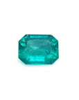 Emerald-cut loose Muzo colombian emerald 1.57 ct. sparkling medium bluish green hue rectangular emerald cut.