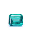 Gia certified emerald-cut loose Colombian emerald left side view displaying crown and table