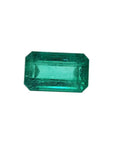 Emerald-cut natural loose colombian emerald, features a medium deep green hue and a rectangular emerald cut.