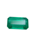 2.55 carat loose natural Colombian emerald with a medium deep green hue and rectangular emerald cut.
