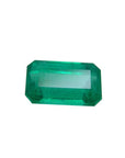 2.55 carat loose natural Colombian emerald with a medium deep green hue and rectangular emerald cut.