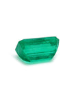Emerald-cut natural loose colombian emerald, underside girdle and pavillon visibles