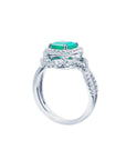 Side profile of this white gold emerald ring on a white background.