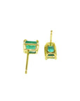 Emerald-cut natural Colombian emerald stud earrings, 1.29 ct, set in 14K yellow gold basket settings.