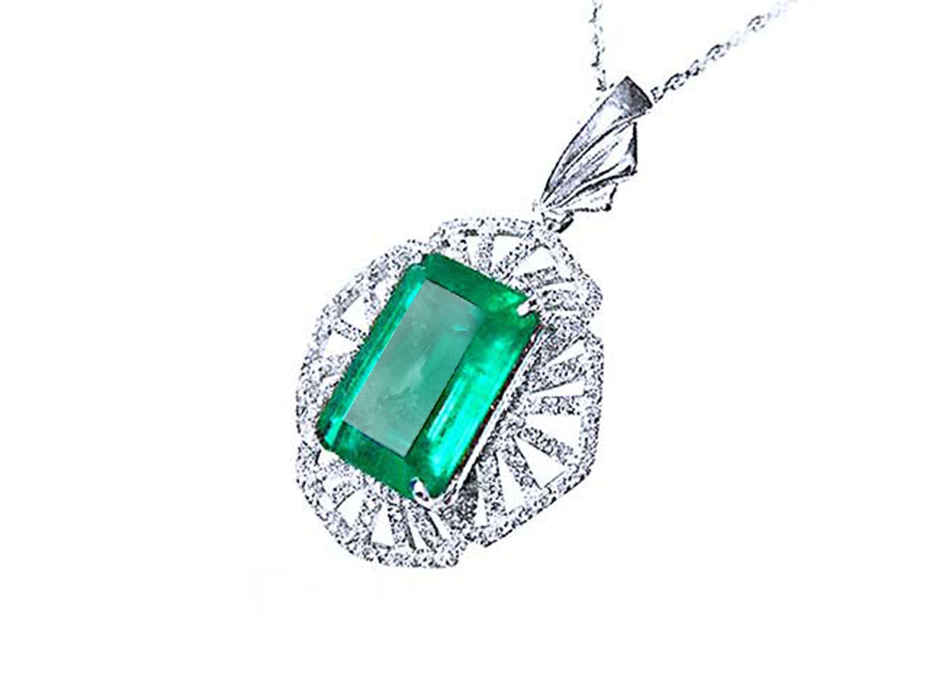 Emerald green gemstone pendant on a white gold chain, topside perspective view.