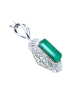 6.19 ct emerald-cut Colombian emerald pendant with natural diamonds in 14K white gold.