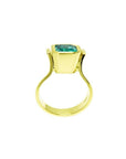 Emerald-cut emerald solitaire ring, bezel set in high polish 14K solid gold.