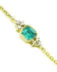Square natural colombian emerald bracelet for women with accent side diamonds 14k yellow gold.