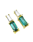 Pair of minimalist baguette cut emerald and diamond stud earrings, right side position top view.
