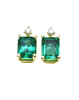 A pair of natural Colombian emerald stud earrings in 14k yellow gold.