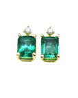 A pair of natural Colombian emerald stud earrings in 14k yellow gold.