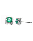 Emerald and diamond tulip stud earrings in 14K white gold with sparkling bluish-green stones.